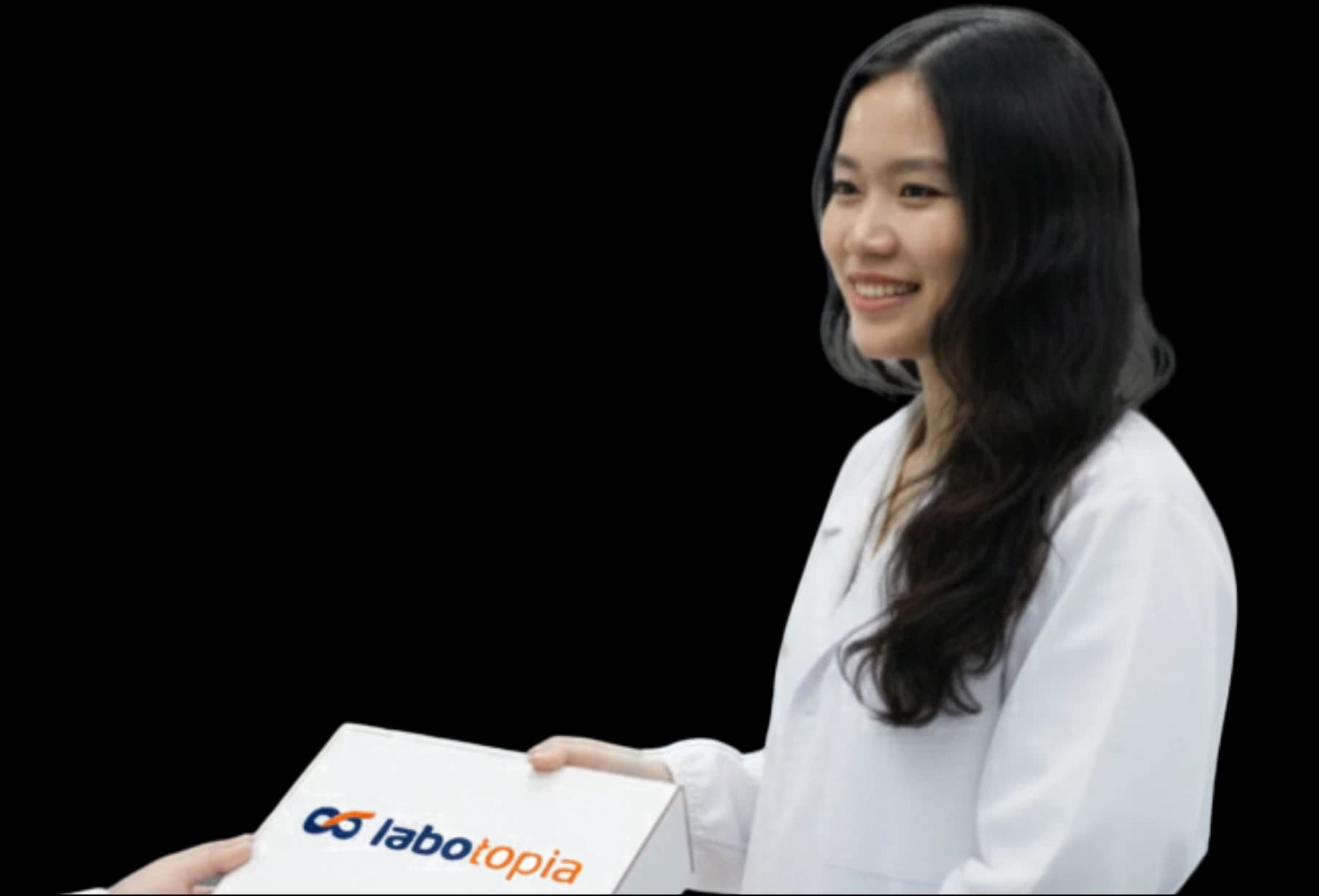 Labotopia employee handing off the package